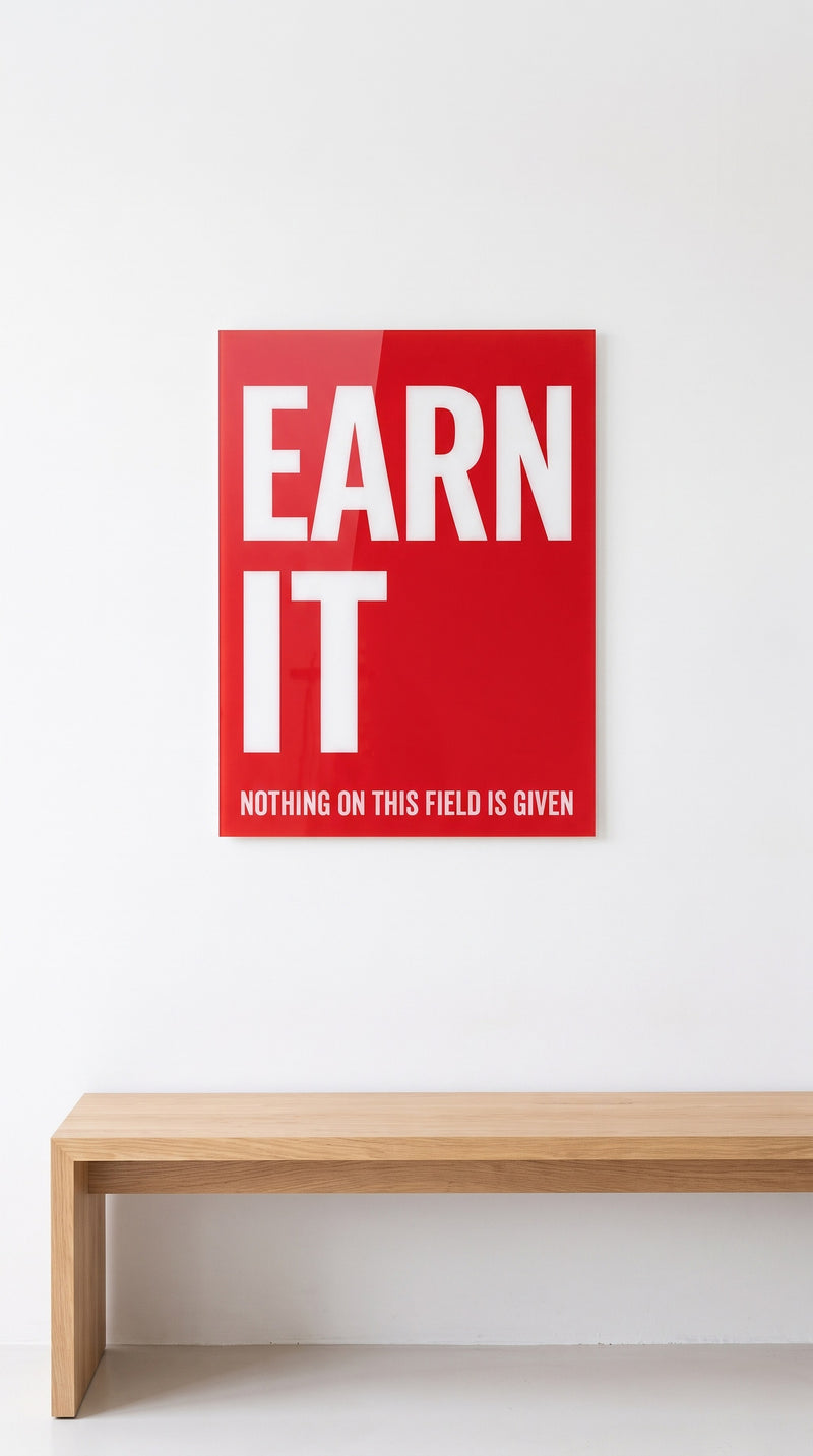 Earn It acrylic sign