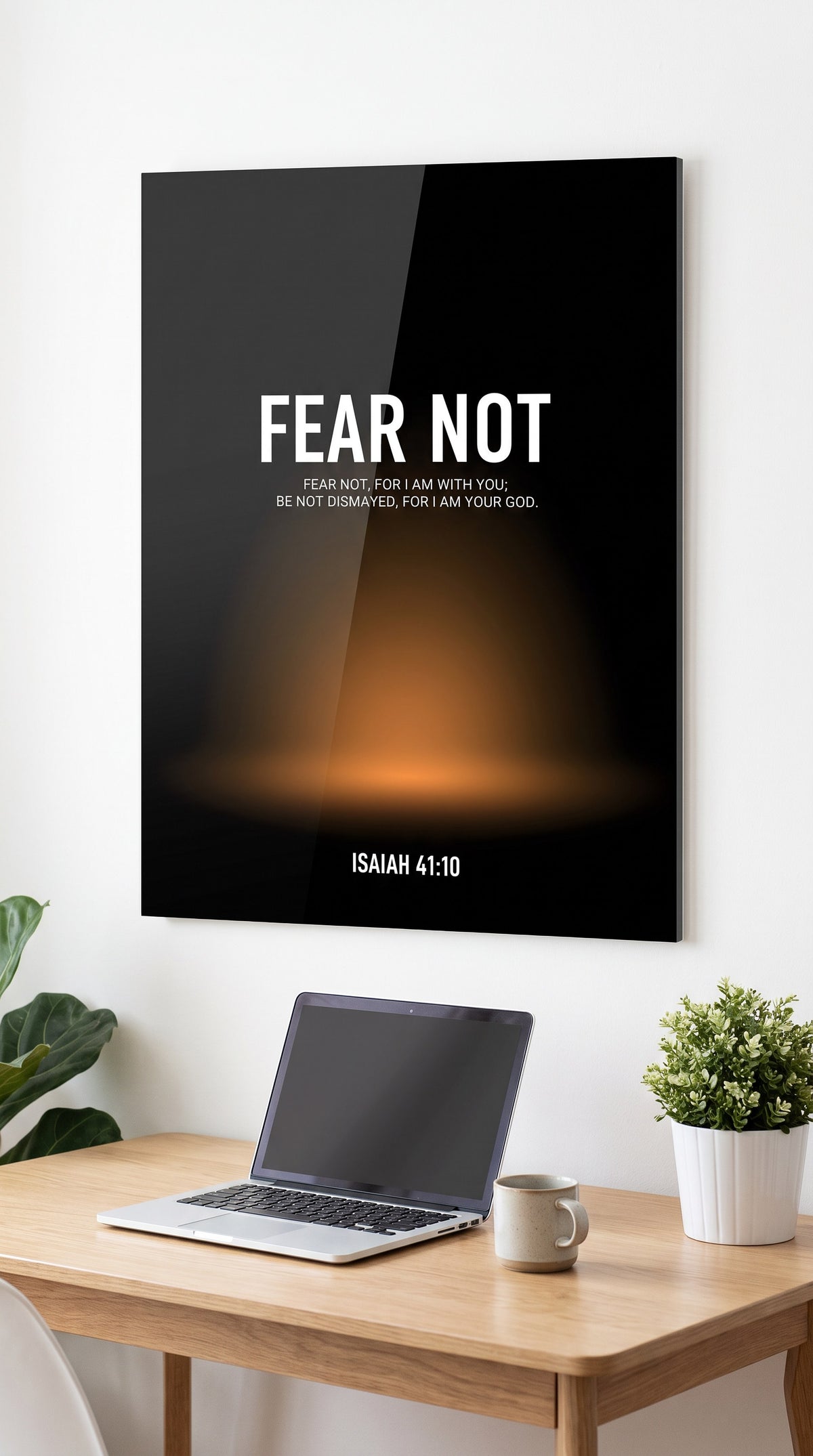 Fear Not acrylic sign in a workspace