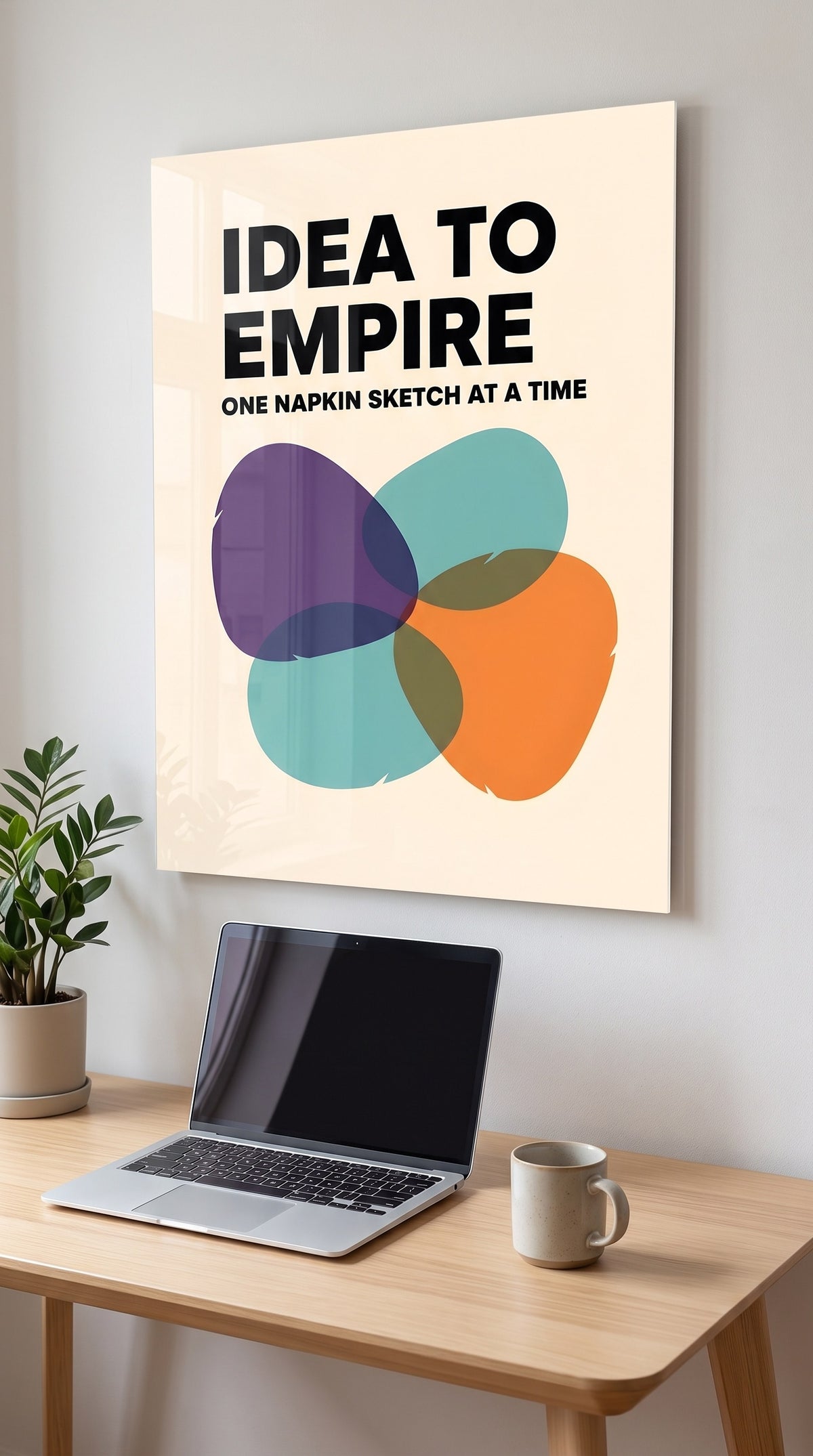 Idea To Empire acrylic sign in a workspace