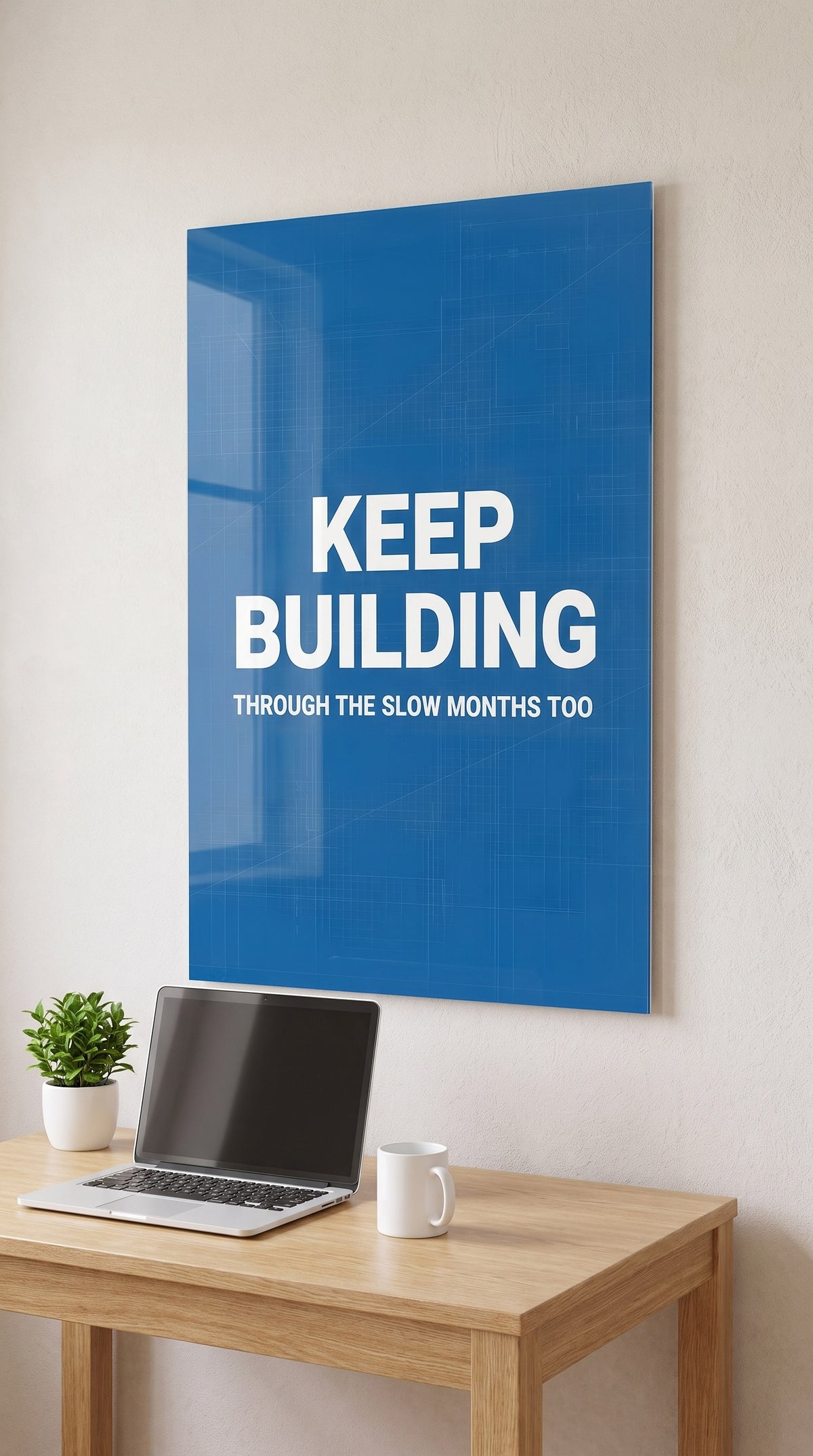 Keep Building acrylic sign in a workspace