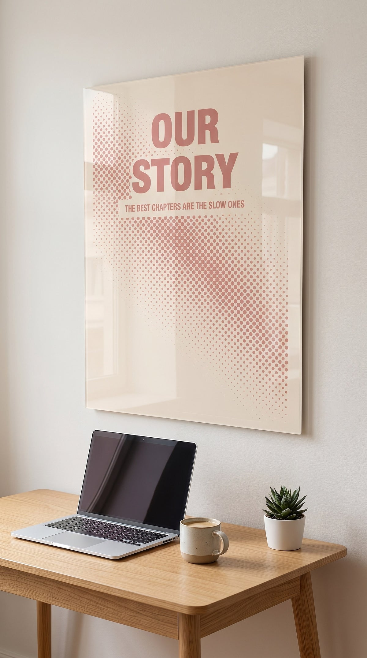 Our Story acrylic sign in a workspace