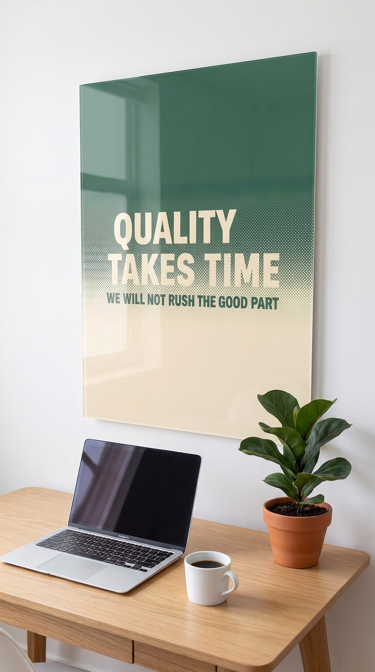Quality Takes Time acrylic sign in a workspace