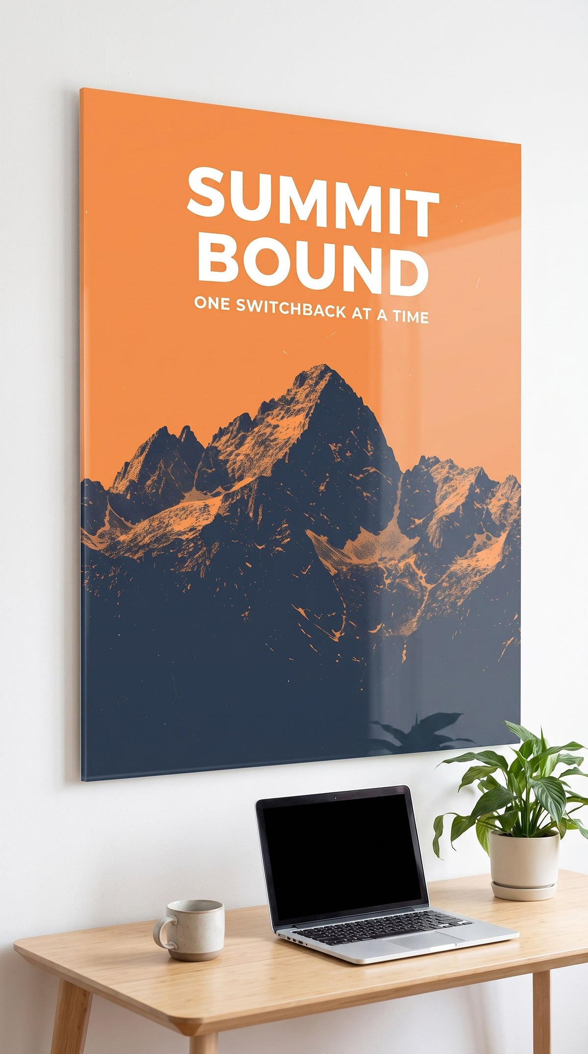 Summit Bound acrylic sign in a workspace